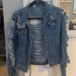 Jean jacket with rips